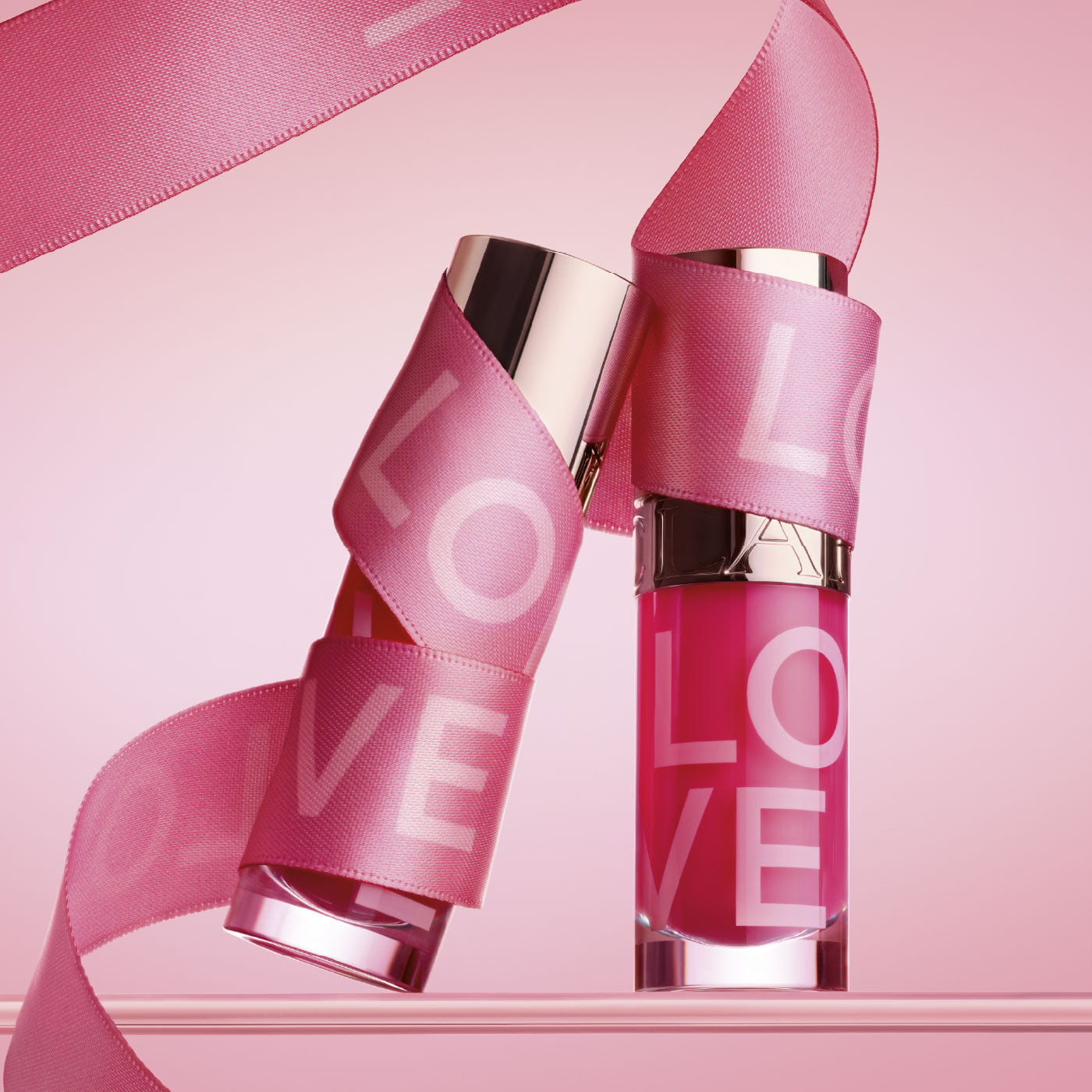 リップコンフォートオイル 31 ロージーキス LOVE edition | CLARINS